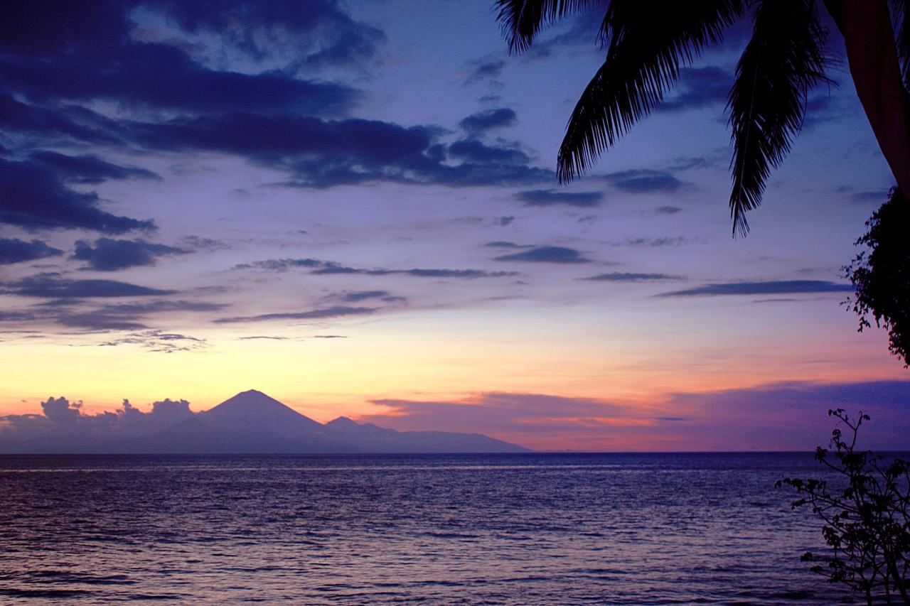 กาตามารัน โฮเต็ล แอนด์ รีสอร์ต Hotel เซงกีกี ภายนอก รูปภาพ Sunset over the Gulf of Davao